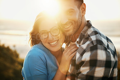 Buy stock photo Cropped shot of a loving couple  spending the day on the beach