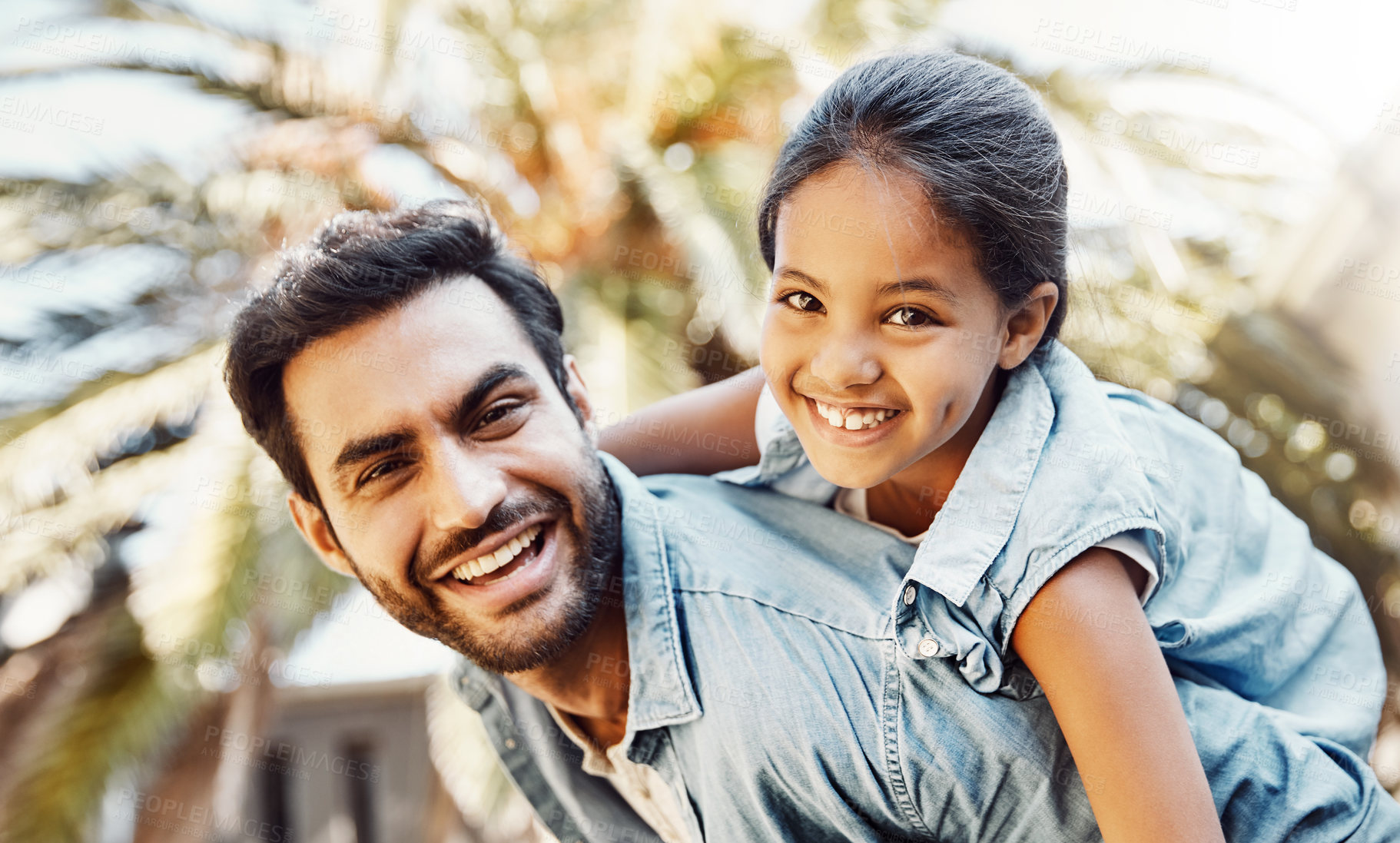 Buy stock photo Man, portrait and child as family with piggyback, love or support in bonding, together and relationship. Dad, kid and happiness in outdoor on weekend, break or holiday for development, growth or care