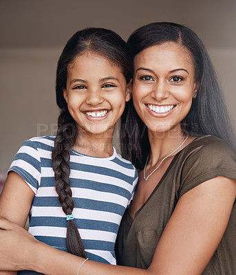 Buy stock photo Shot of a happy mother and daughter spending some quality time together at home