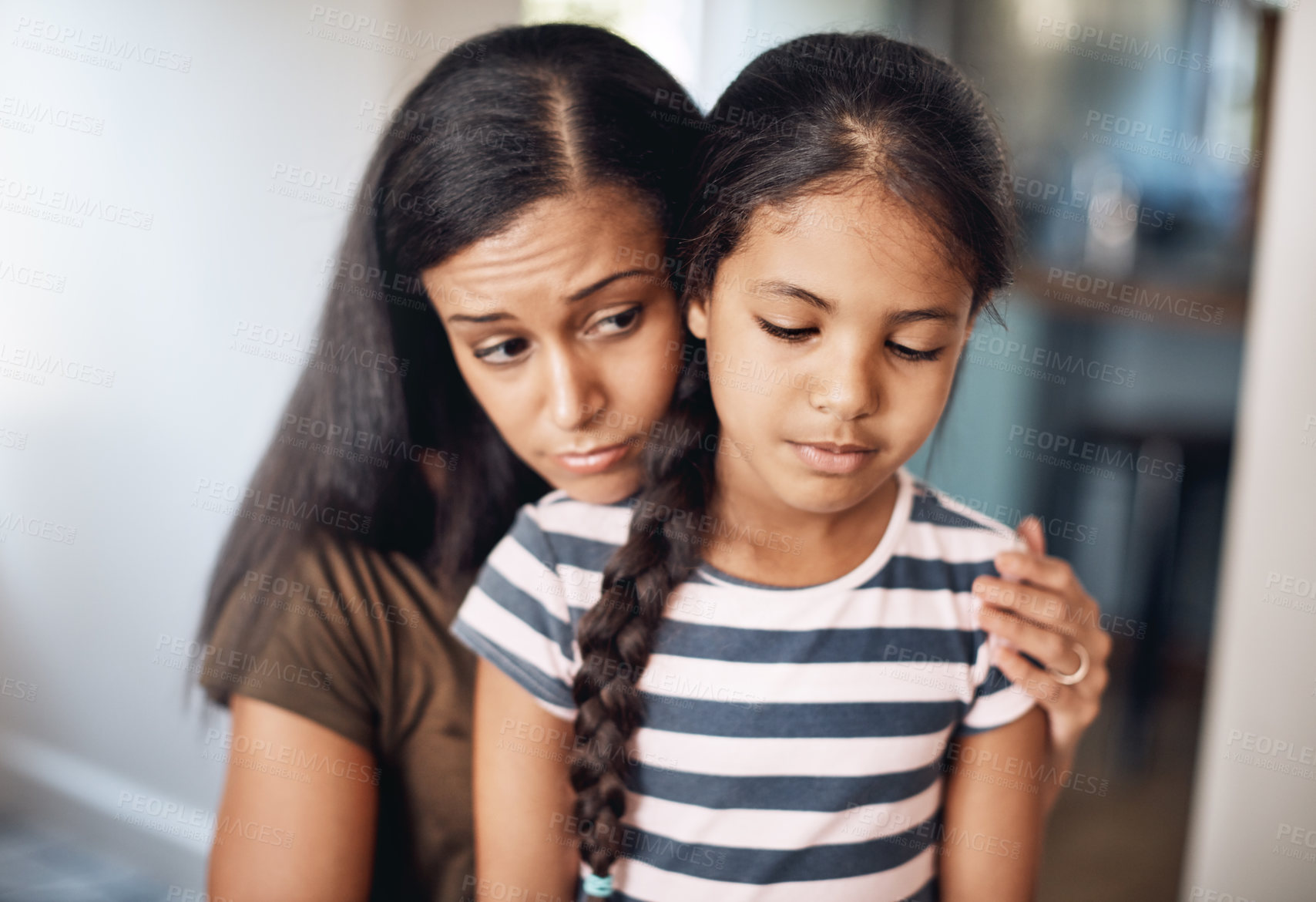 Buy stock photo Mom, girl child and sad with comfort for mistake in house, depression or fear in apartment. Mother, daughter and calm empathy in home for childhood fail, together with support for problem or kindness