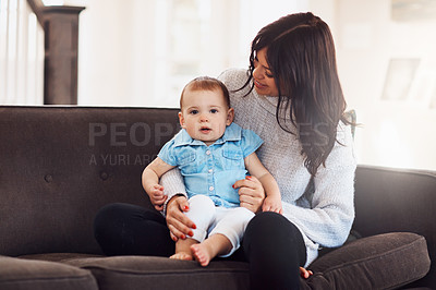 Buy stock photo Family, mother and baby on sofa in living room, embrace child for love and bonding for support. Smile, motherhood and toddler with woman together, hug and play by sitting for relationship at home