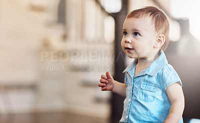 Buy stock photo Shot of a cute baby girl at home