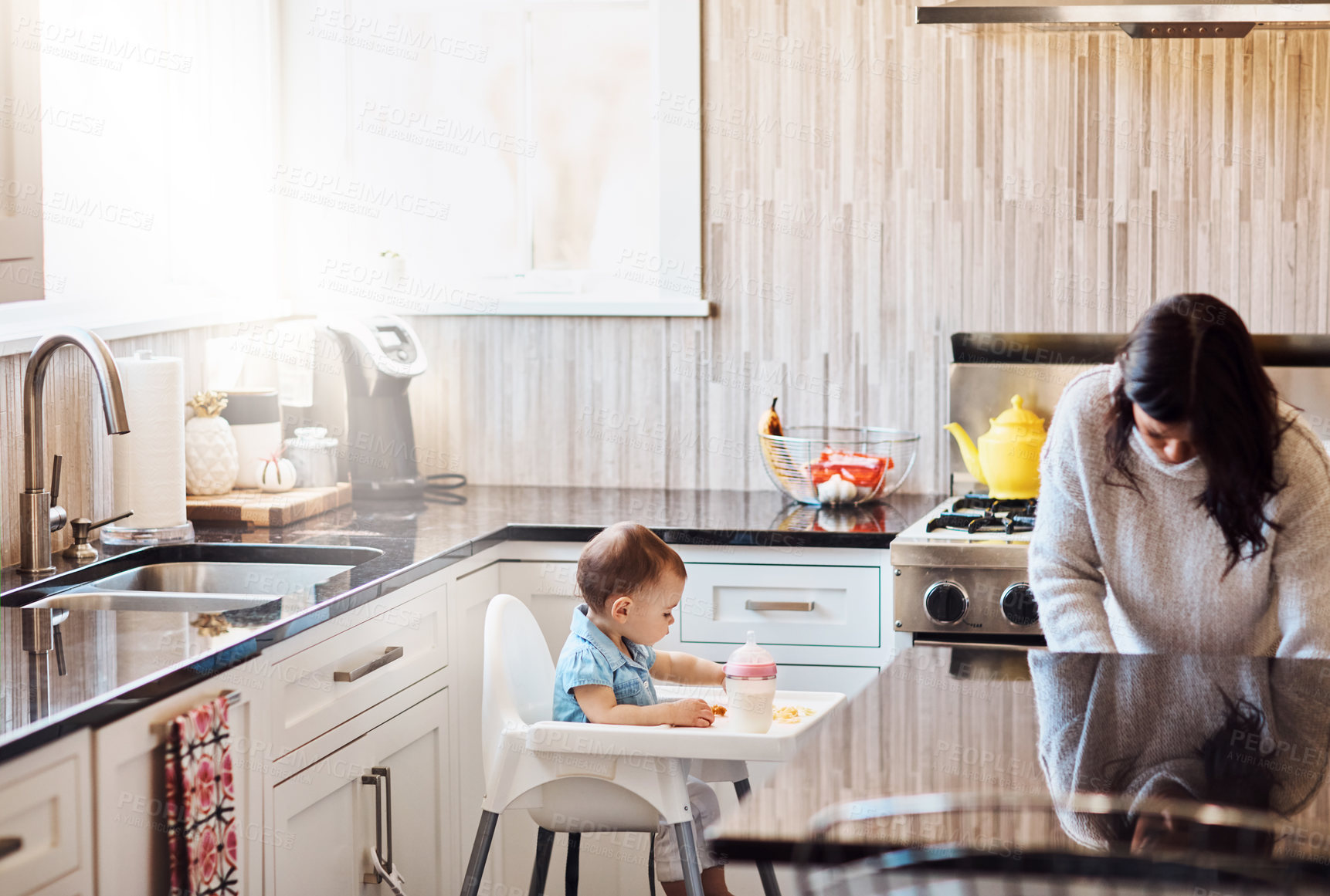 Buy stock photo Woman, baby and feeding chair in kitchen in home, parenting and childhood development or growth in morning apartment. Infant, food and nutrition with formula or people together, caring and love