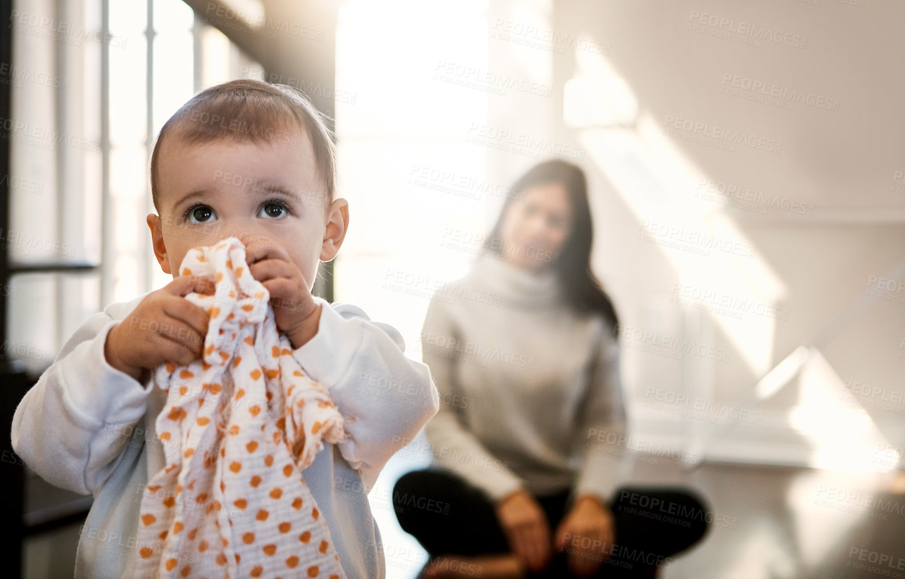 Buy stock photo Baby, kid and playing with cloth in home with learning, growth and support from mother in living room. Toddler, child and walking in lounge with clothes, fabric or blanket for comfort or first steps