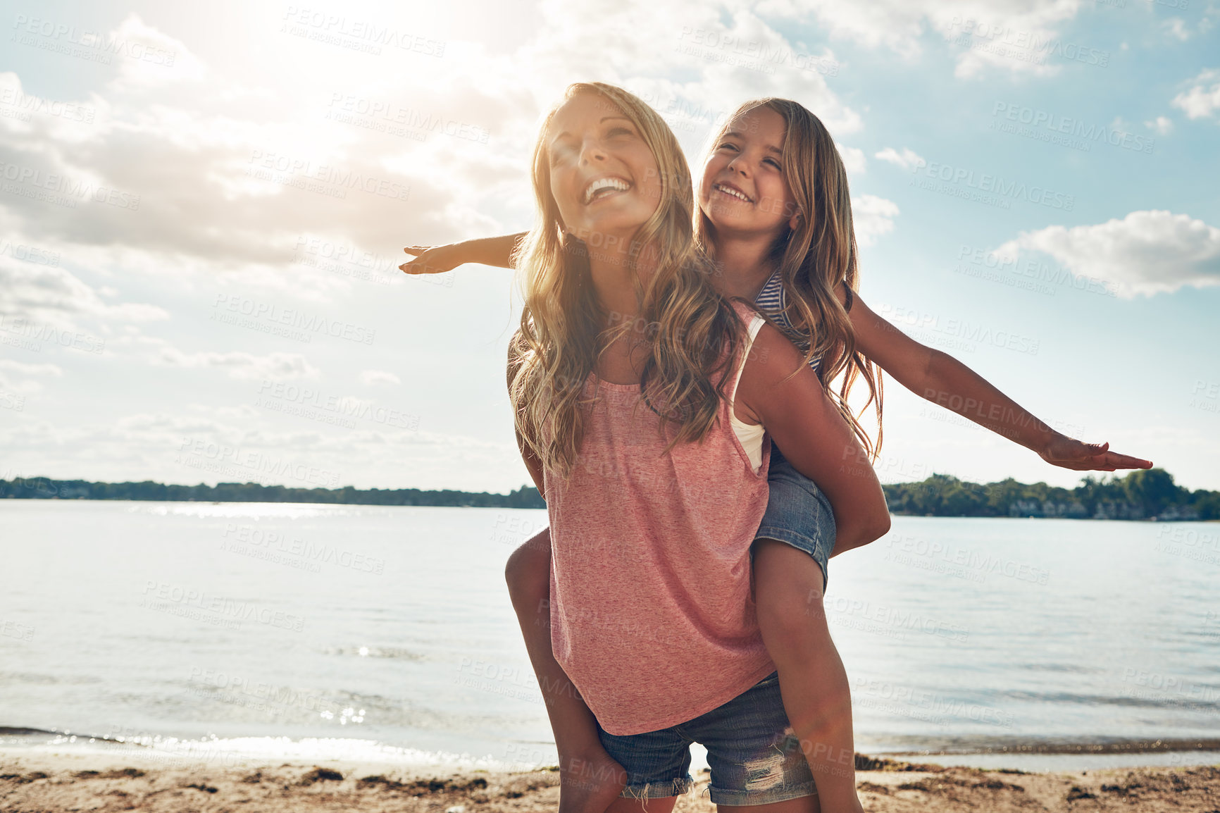Buy stock photo Travel, mother and child on beach with airplane, smile and playing on adventure holiday in Australia. Sky, mom and girl on ocean vacation with summer fun, happy and bonding together with piggyback