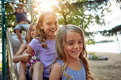 Buy stock photo Kids, park slide and group in summer to relax with friends on sunshine playground on vacation. Happy, holiday and children together for party, games or smile outdoor at school recess or break