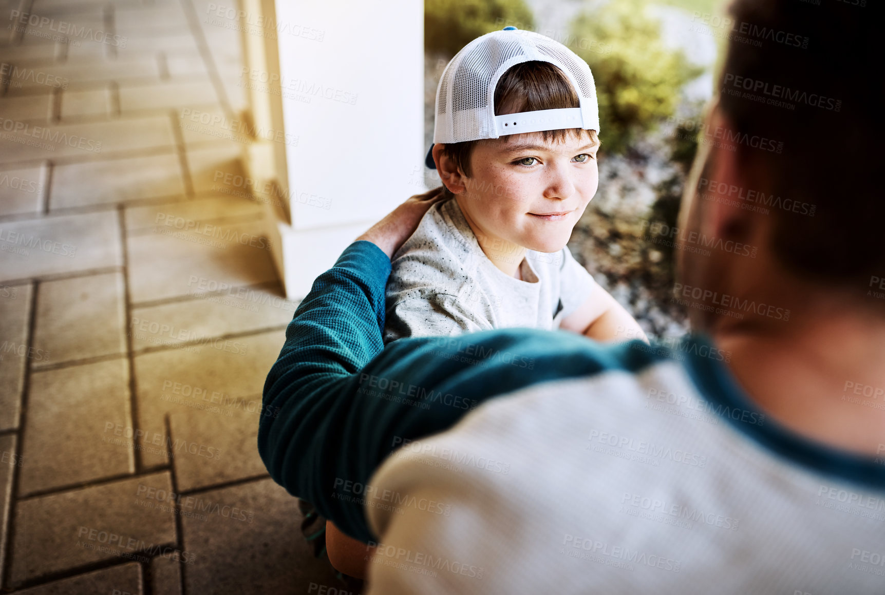 Buy stock photo Advice, guidance and son talking to father on patio of home for child development or growth. Family, hand on shoulder or support with boy and dad outdoor in backyard for communication or sharing