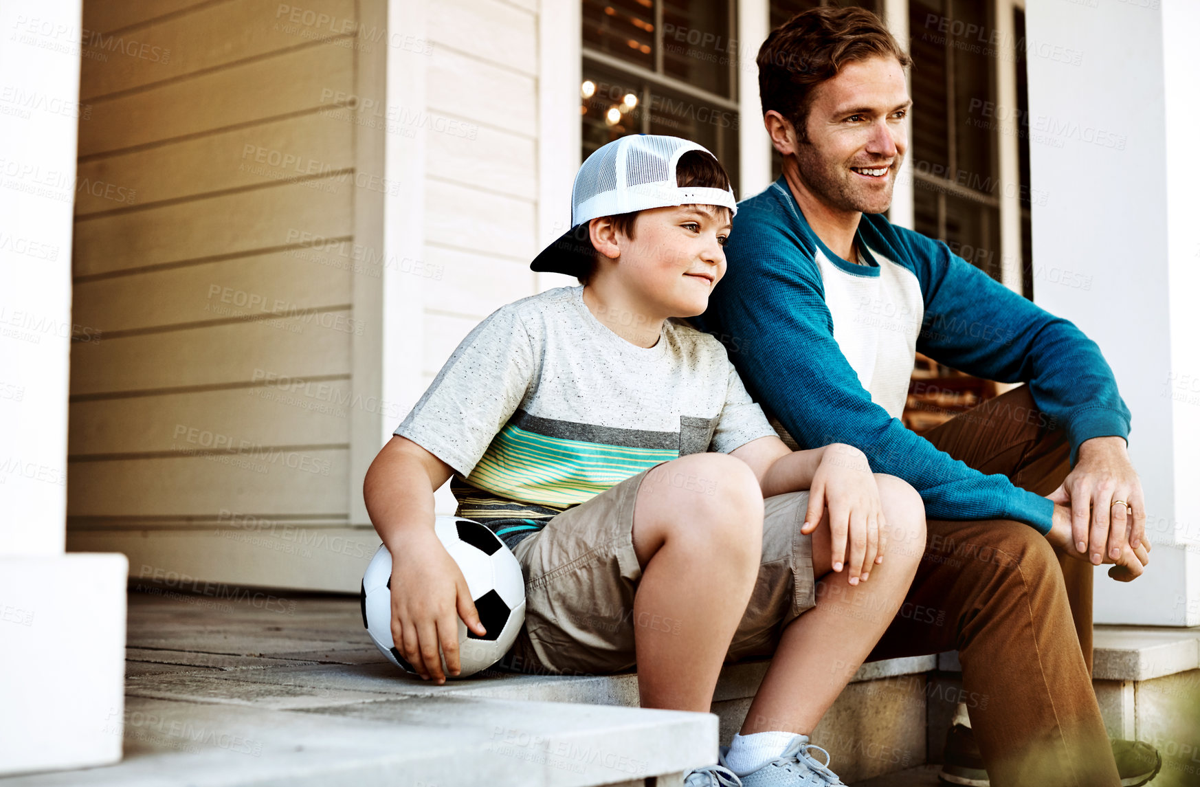 Buy stock photo Outdoor, ball and father with child on porch in home ready for playing soccer, sports and fun on weekend. Family, happy parent and dad with young boy talking, in conversation and relax for bonding