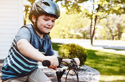 Buy stock photo Child, cycling and bicycle with smile outdoor for travel, balance training and fitness fun. Kid, riding and bike with helmet safety, learning coordination and adventure for fresh air in neighborhood