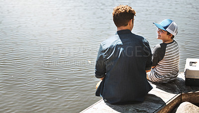 Buy stock photo Fishing, lake and father with kid in nature for teaching skill, adventure and vacation together outdoors. Family, happy and dad with young boy by river for sports, hobby and catch fish in childhood