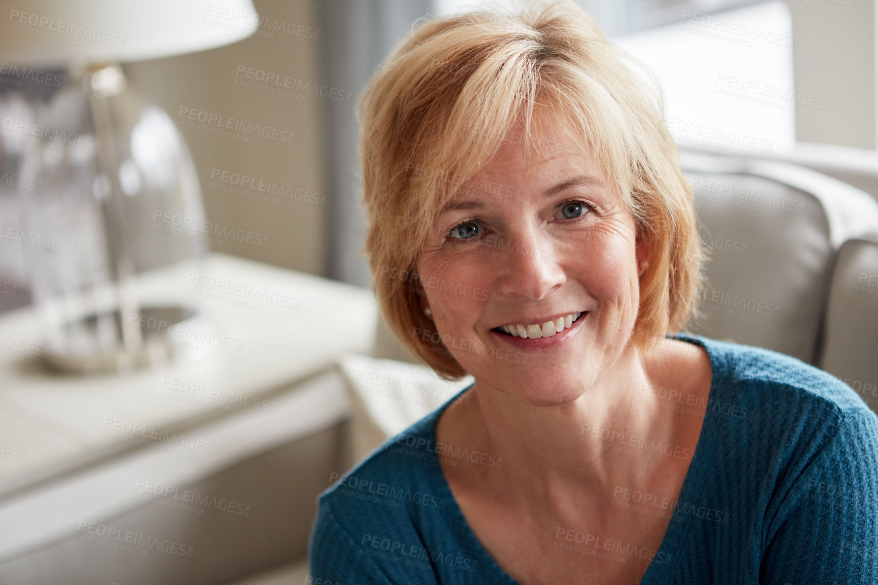 Buy stock photo Smile, portrait and relax with woman on sofa in home for weekend break, comfortable and morning rest. Happiness, calm and me time with mature person on couch in living room of apartment for peace