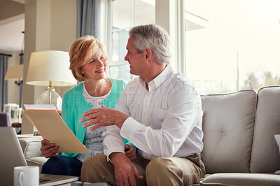 Buy stock photo Finance, laptop and senior couple on sofa with financial report, insurance and investment in home. Retirement, marriage and mature man and woman on computer for internet banking, pension or savings