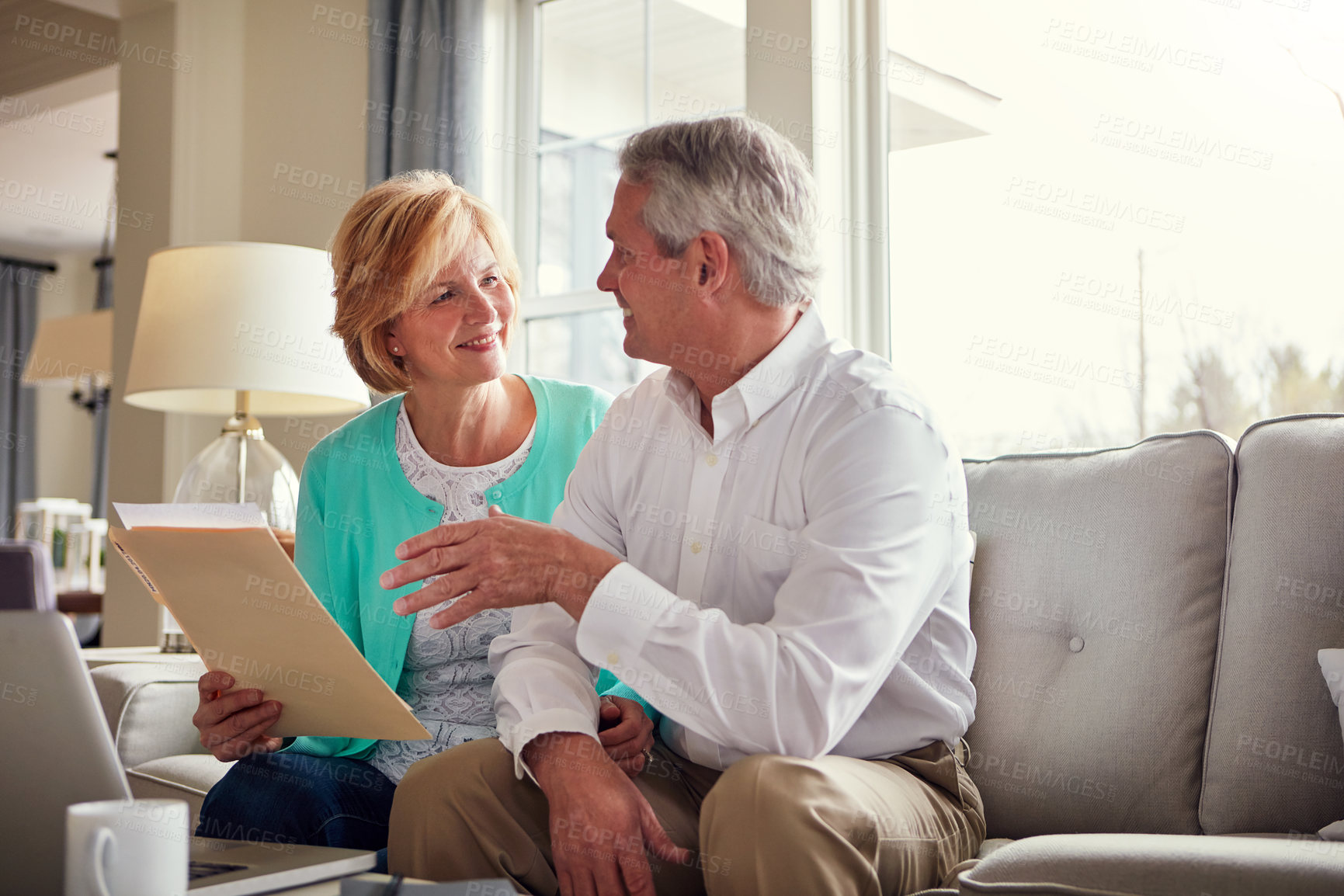 Buy stock photo Finance, laptop and senior couple on sofa with financial report, insurance and investment in home. Retirement, marriage and mature man and woman on computer for internet banking, pension or savings