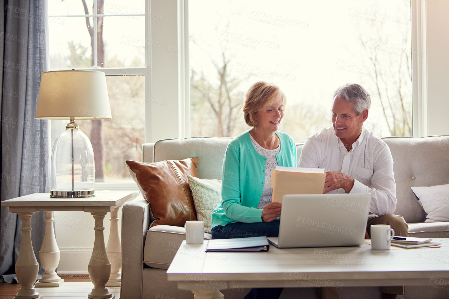 Buy stock photo Documents, laptop and mature couple in home with financial report, insurance and investment. Retirement, marriage and senior man and woman on computer for finance, pension and internet banking