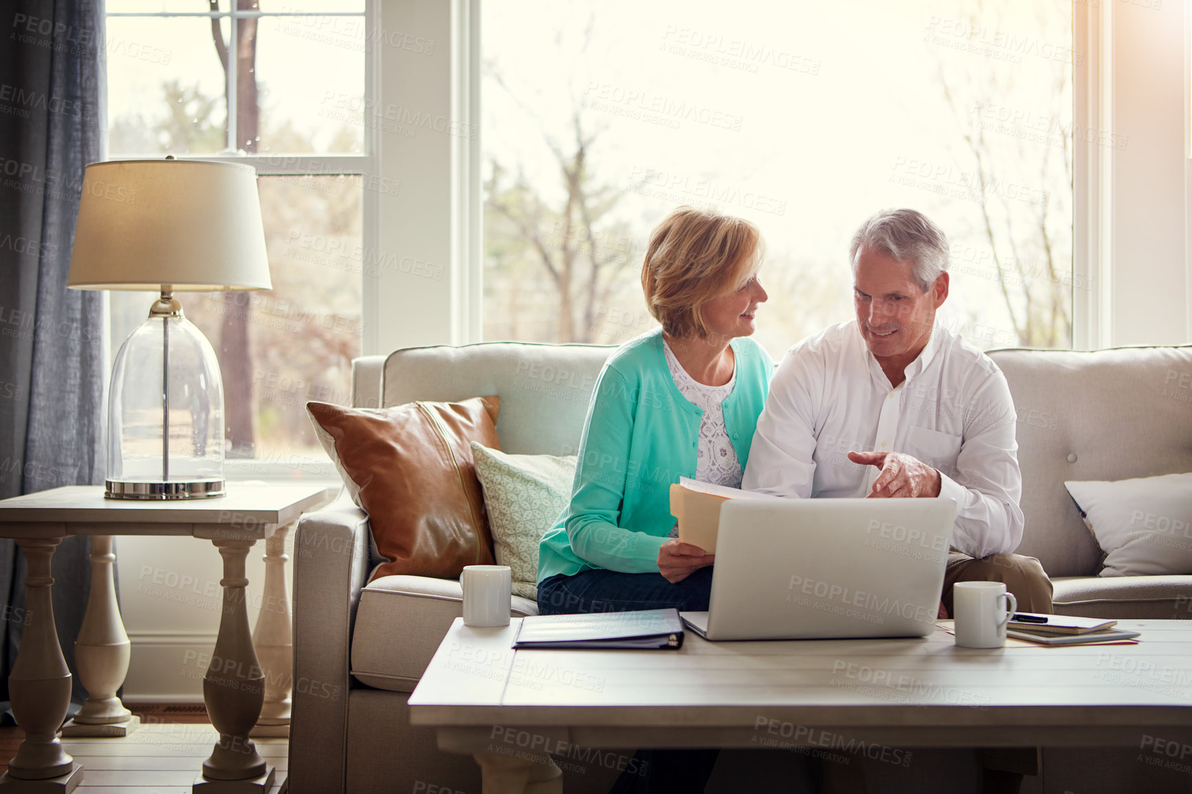 Buy stock photo Documents, laptop and old couple on sofa with financial budget, insurance and investment in home. Retirement, marriage and mature man and woman on computer for finance, online banking or savings