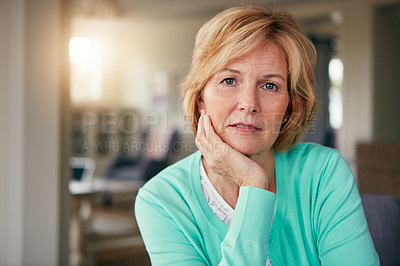 Buy stock photo Portrait of a mature woman relaxing at home