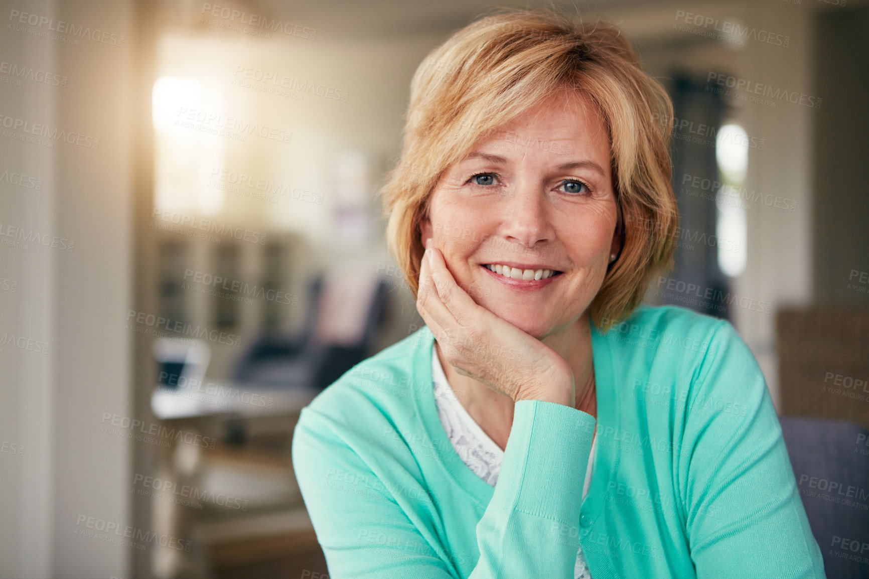 Buy stock photo Portrait of a mature woman relaxing at home