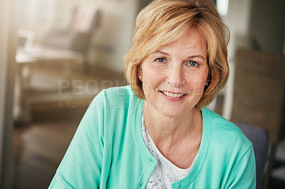 Buy stock photo Portrait of a mature woman relaxing at home