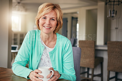 Buy stock photo Portrait of a mature woman relaxing at home