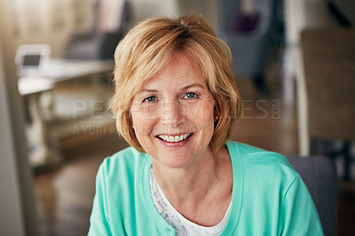 Buy stock photo Portrait of a mature woman relaxing at home