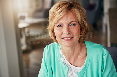 Buy stock photo Portrait of a mature woman relaxing at home