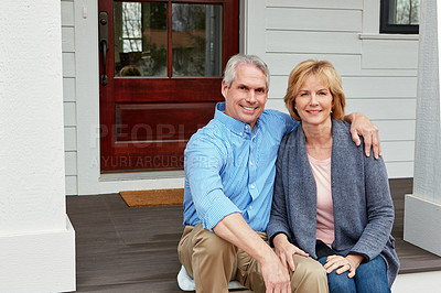 Buy stock photo Real estate, portrait and senior couple hug on porch with moving, success or retirement investment pride. Mortgage, property or proud old people embrace at new house, dream home or relocation