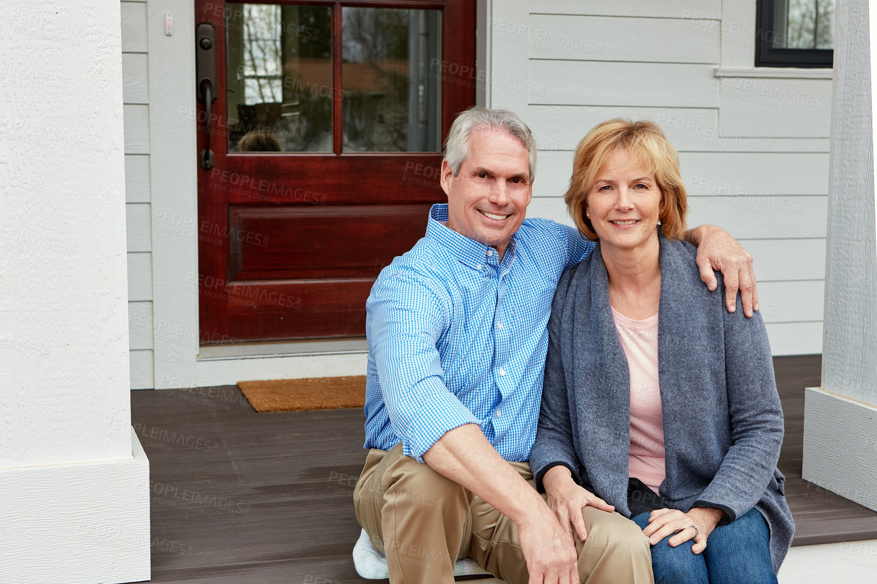 Buy stock photo Real estate, portrait and senior couple hug on porch with moving, success or retirement investment pride. Mortgage, property or proud old people embrace at new house, dream home or relocation