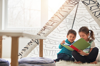 Buy stock photo Children, reading and tent in house with book for story time, education and literature adventure for storytelling. Boy, girl and together on floor for fantasy or bonding, learning and development.