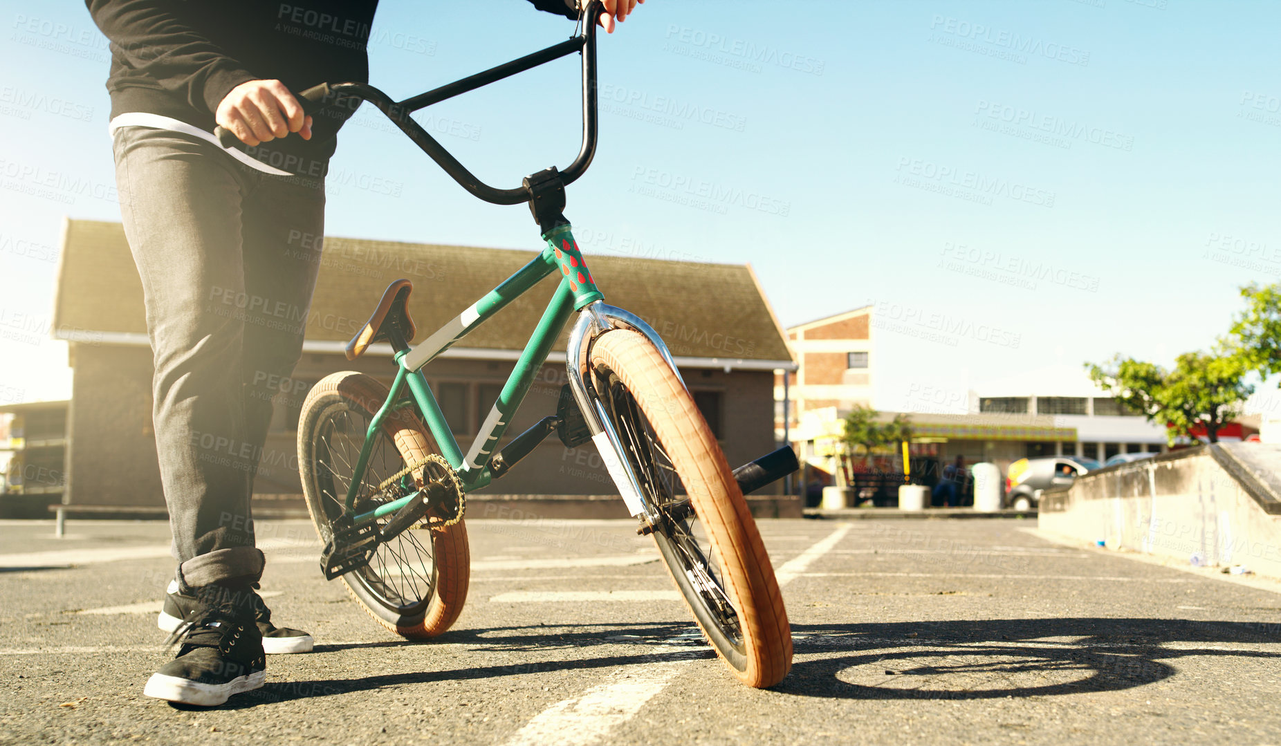 Buy stock photo Cropped shot of an unrecognizable male BMX biker outside