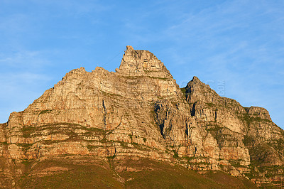 Buy stock photo Landscape view of Table Mountain in Cape Town, South Africa against blue sky with copy space. Travel and tourism of famous landmark, rocky and rough terrain. Holiday and vacation abroad and overseas