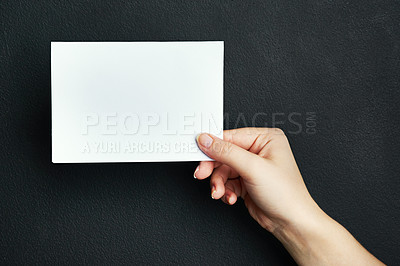 Buy stock photo Hand, studio and blank card with mockup space for sale, promotion offer or information about us. Closeup, signage or person with placard for news, announcement or logo advertising on dark background