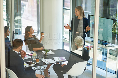 Buy stock photo Business woman, talking and presentation for planning, strategy and review with feedback in office. Team, meeting and company development for project workshop, sales and financial report with screen