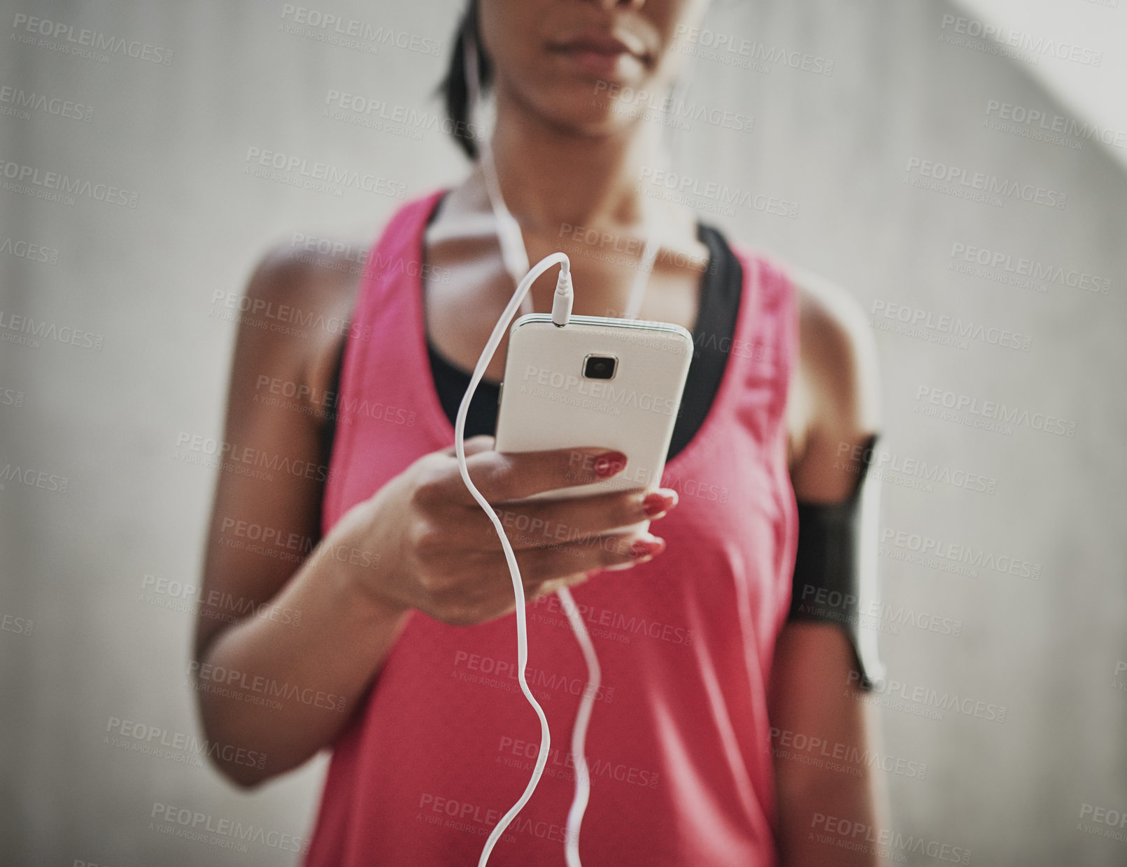 Buy stock photo Woman, online and hand with smartphone for fitness, exercise application and workout playlist with earphones for music. Girl, internet and cellphone for social media, training schedule and tracking.