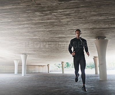 Buy stock photo Man, portrait and running for fitness outdoor with music, listening to podcast and exercise for healthy body. Athlete, african person and earphones with audio, radio and sound for workout or training