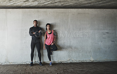 Buy stock photo Shot of a sport young couple out for a run