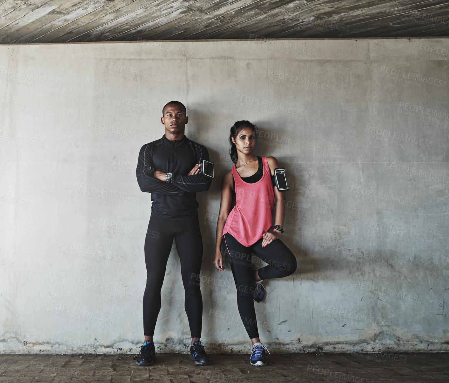 Buy stock photo Shot of a sport young couple out for a run