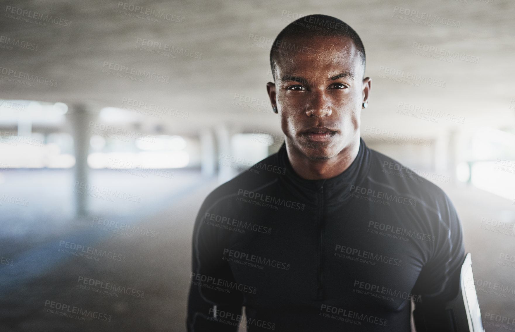 Buy stock photo Shot of a young person working out in and around the city