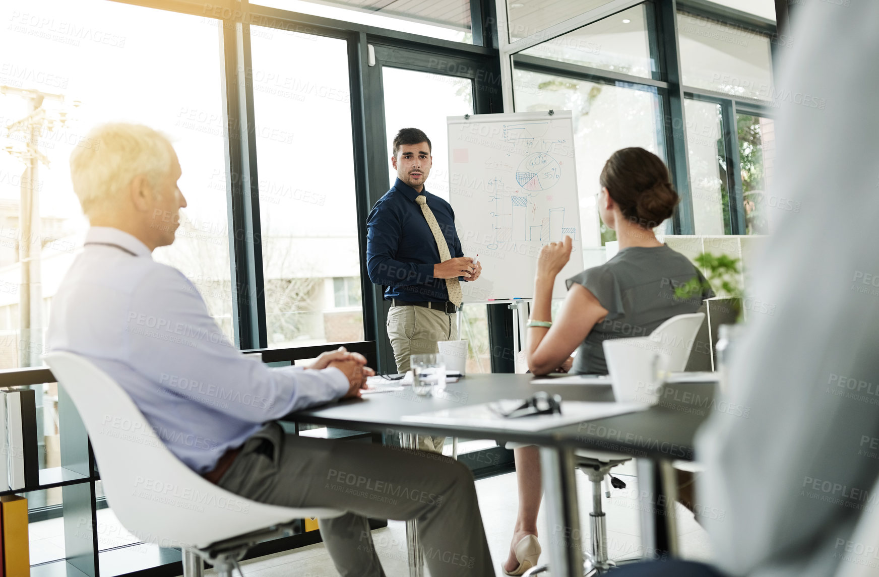 Buy stock photo Shot of corporate businesspeople in the office