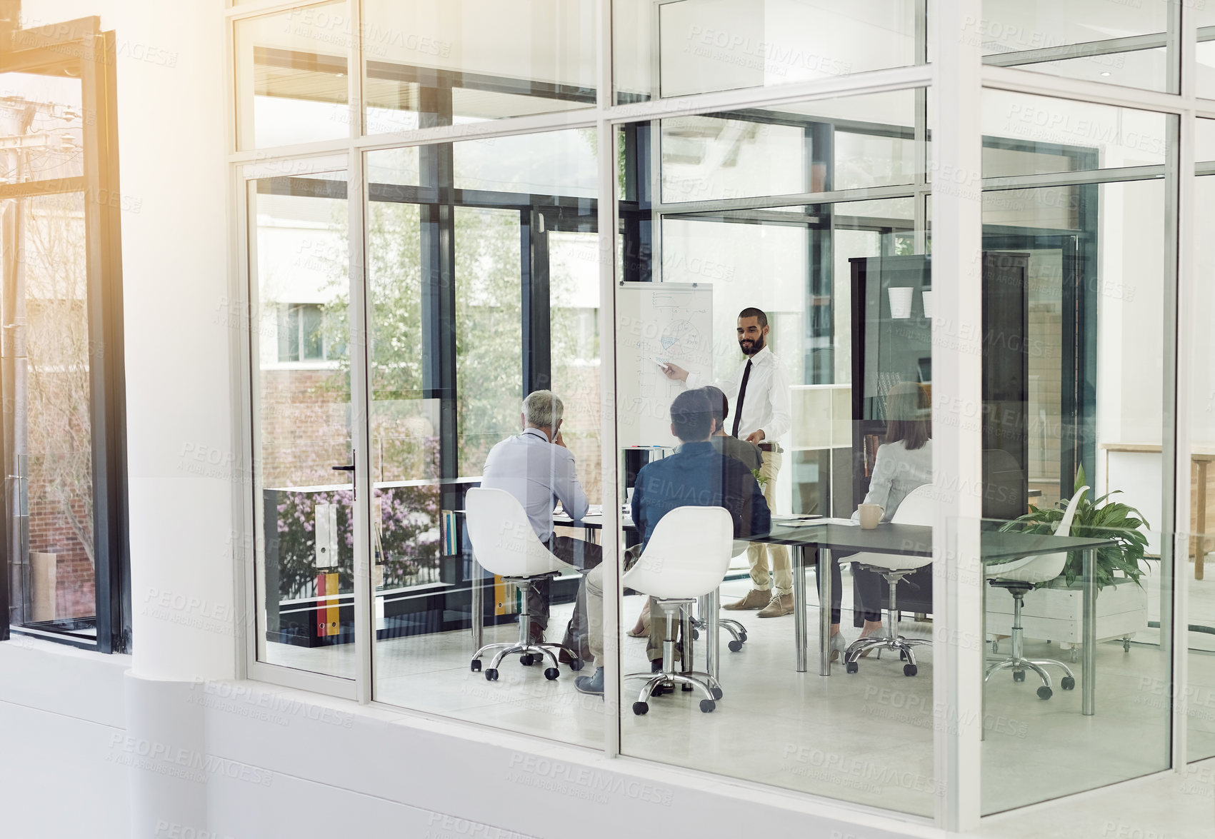 Buy stock photo Shot of corporate businesspeople in the office