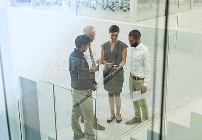 Buy stock photo Shot of corporate businesspeople in the office