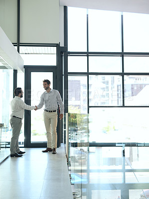 Buy stock photo Welcome, handshake and business people in office building for consulting, help or b2b networking. Teamwork, partnership and men shaking hands for thank you, collaboration and hiring, deal or offer