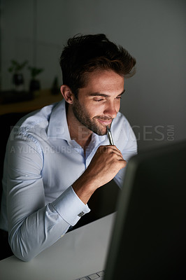 Buy stock photo Smile, thinking and businessman with pen by computer for email, internet and working late in office for corporate career. Happiness, desk and lawyer with technology for communication in workspace