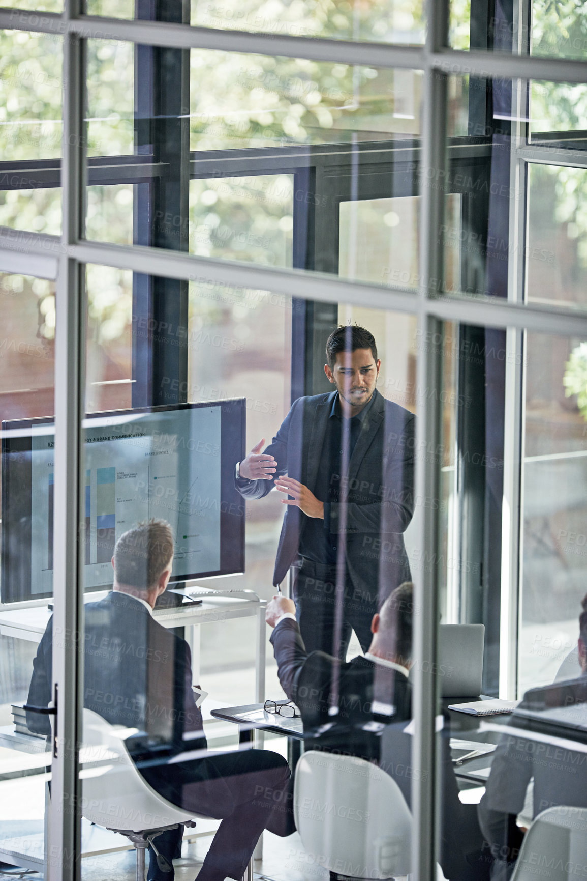 Buy stock photo Shot of corporate businesspeople meeting in the boardroom