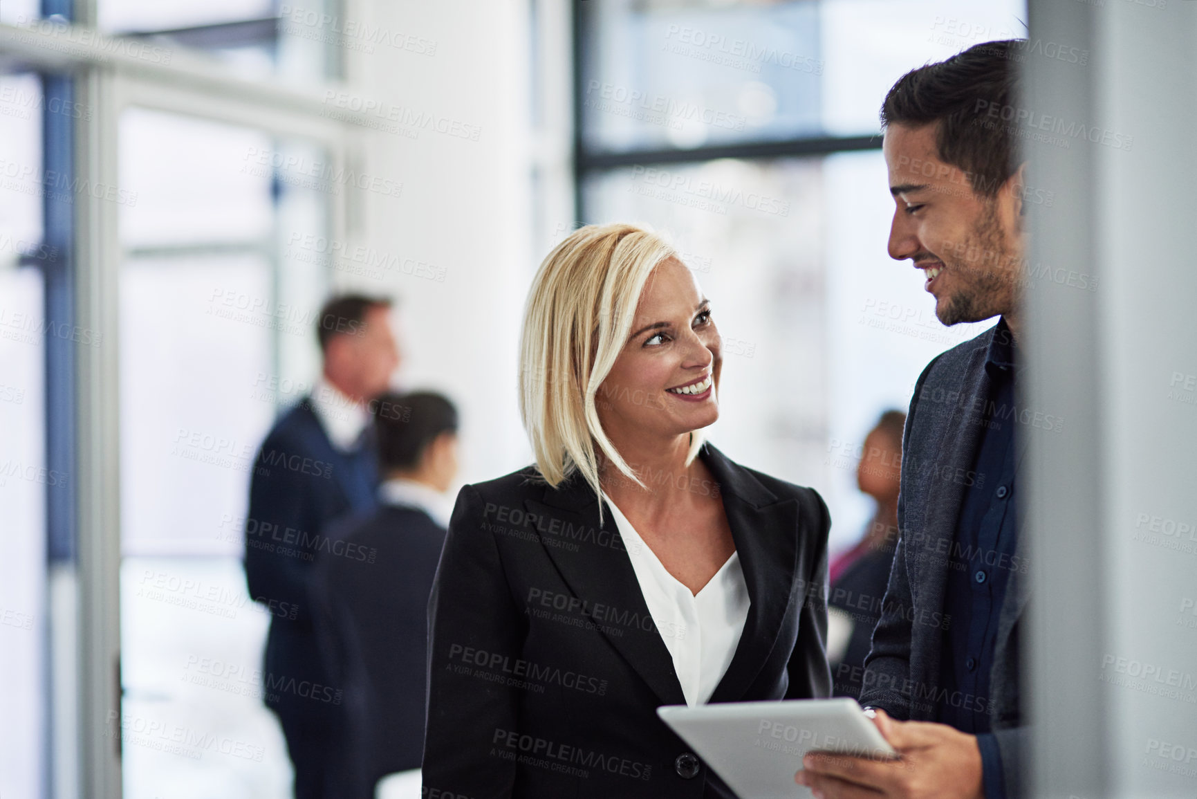 Buy stock photo Shot of corporate businesspeople meeting in the boardroom