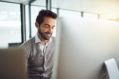Buy stock photo Cropped shot of a businessman working in his office