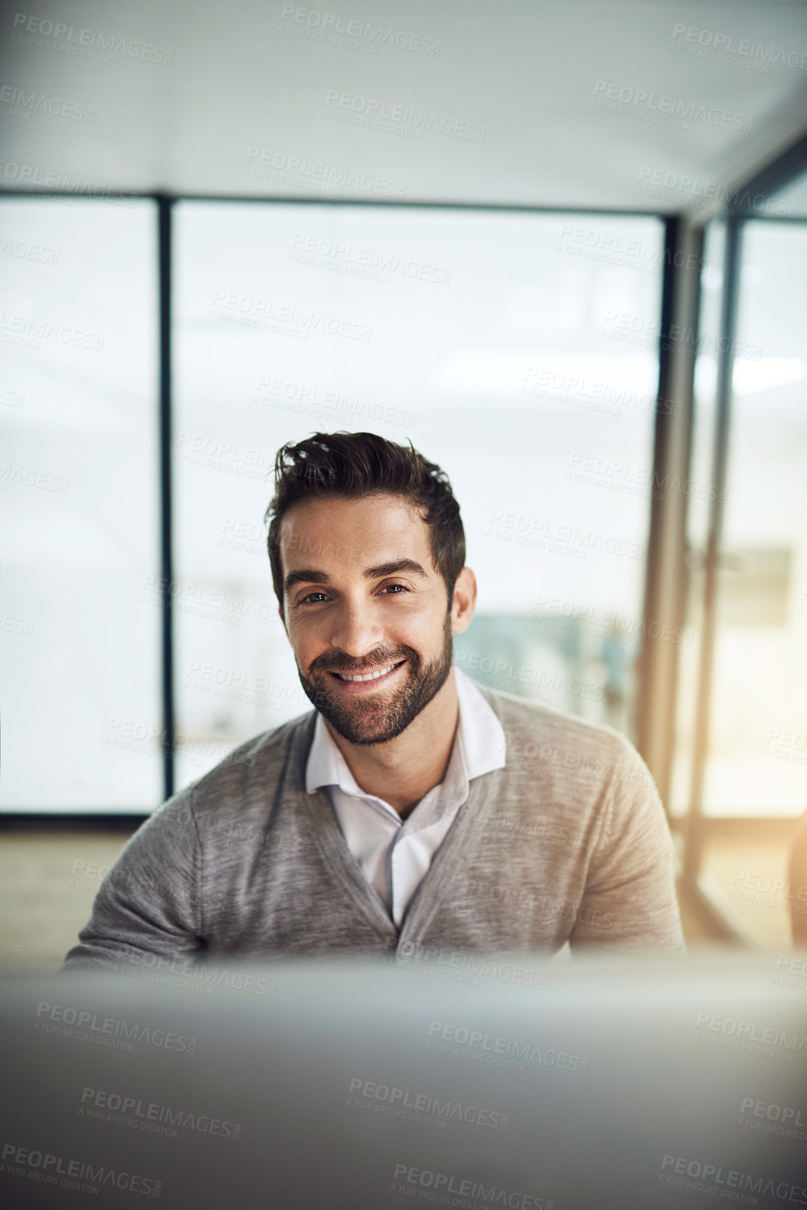 Buy stock photo Cropped shot of a businessman working in his office