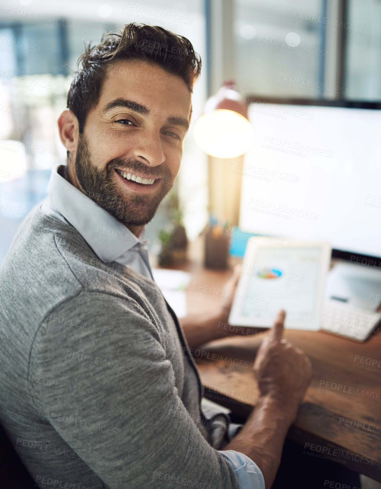 Buy stock photo Happy man, portrait and night with tablet for finance, corporate growth or profit at office. Businessman or employee with smile or technology for financial investment, revenue or report at workplace