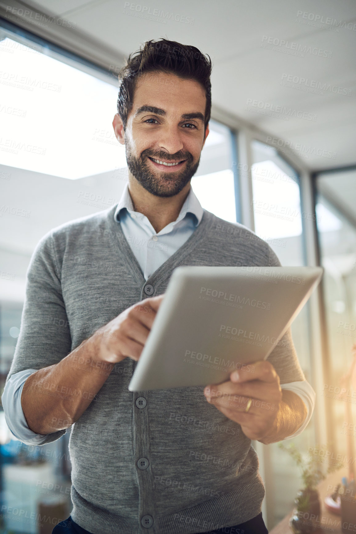 Buy stock photo Cropped shot of a businessman working in his office