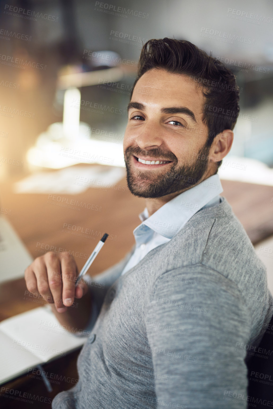 Buy stock photo Confidence, portrait and man at desk with pen, notes and business plan at digital agency with smile. Trust, pride and happy businessman in office with report, online research or project management