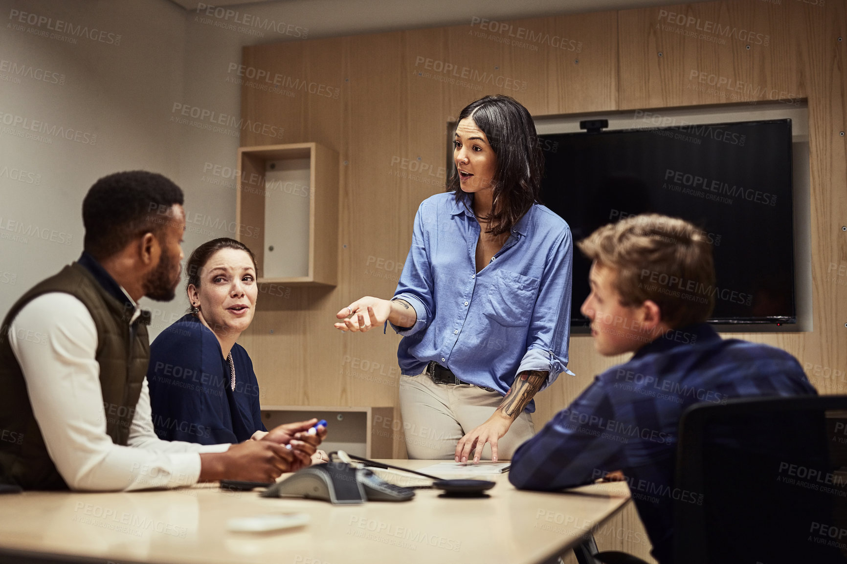 Buy stock photo Shot of a businesswoman giving a presentation to her colleagues in an office